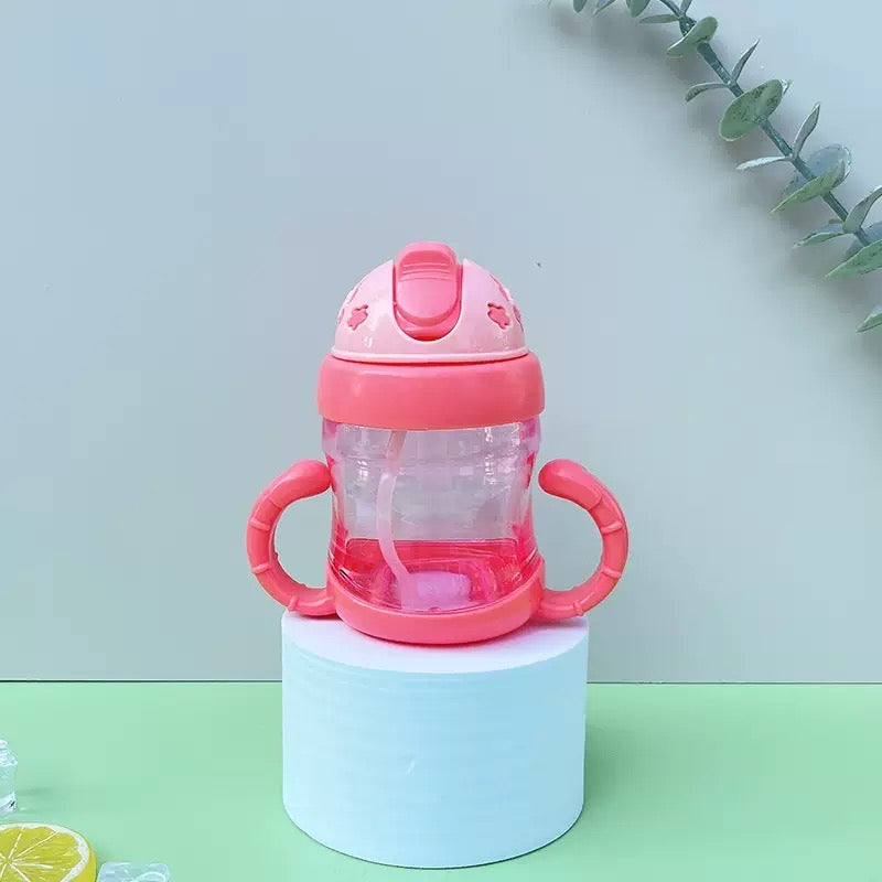 Botella transparente con bombilla