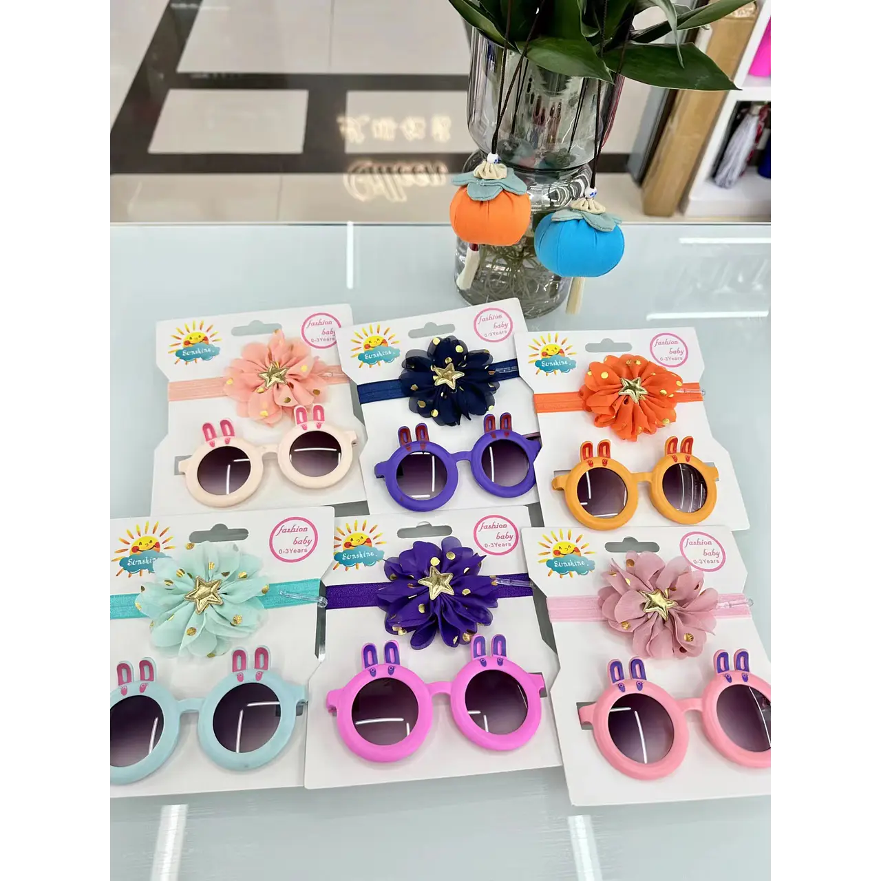 Set de cintillo y lentes de sol